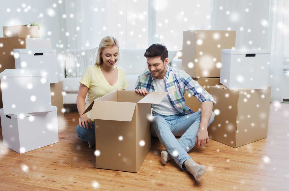 couple taking out items in their new home